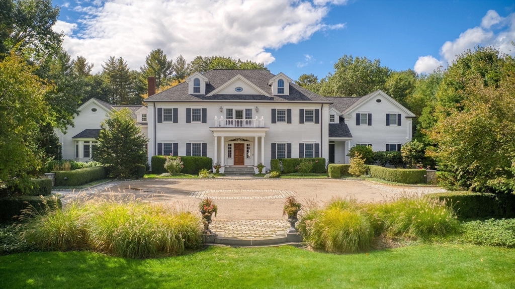 287 Westford Road Concord, MA 01742 - Photo 1 of 42 a front view of a house with a garden