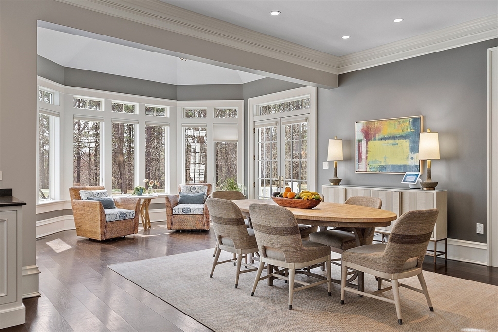 287 Westford Road Concord, MA 01742 - Photo 11 of 42 a dining room with furniture and wooden floor