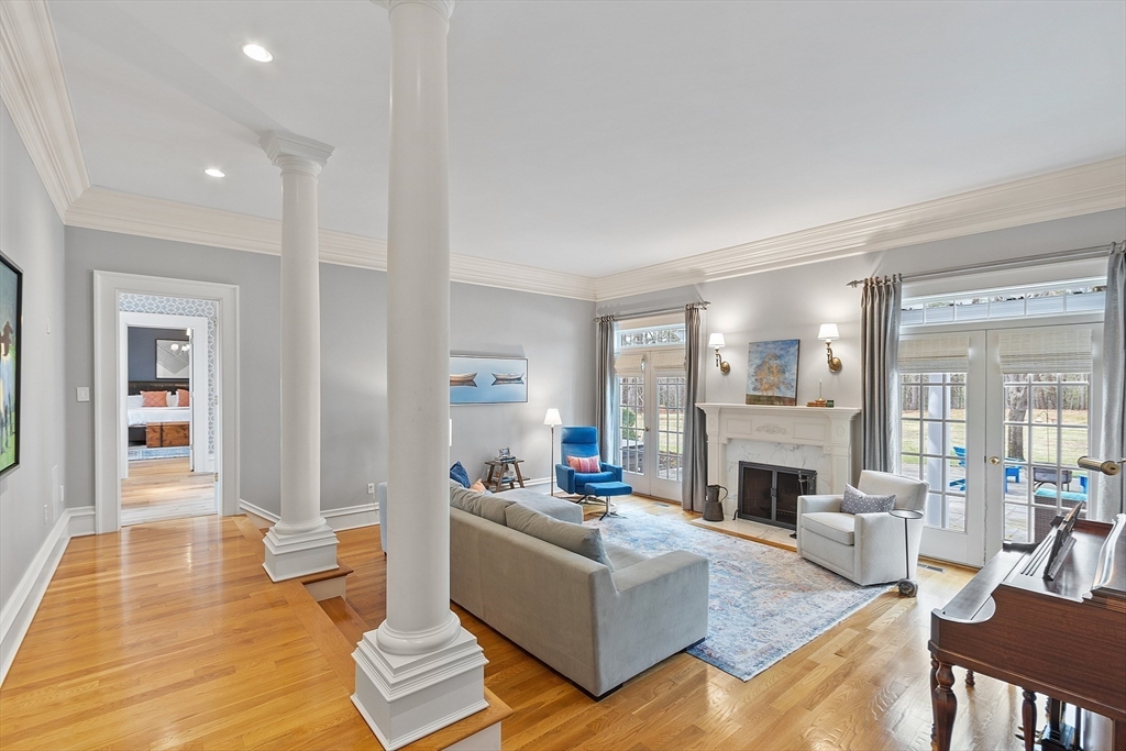 287 Westford Road Concord, MA 01742 - Photo 15 of 42 a living room with furniture and a fireplace