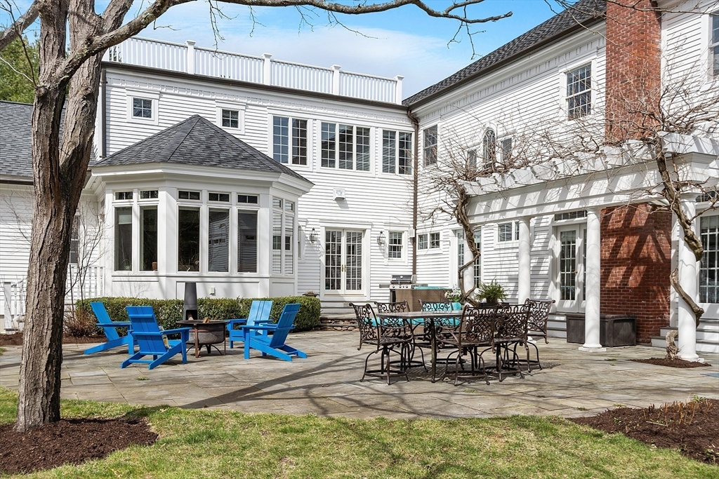 287 Westford Road Concord, MA 01742 - Photo 17 of 42 a view of a house with a patio
