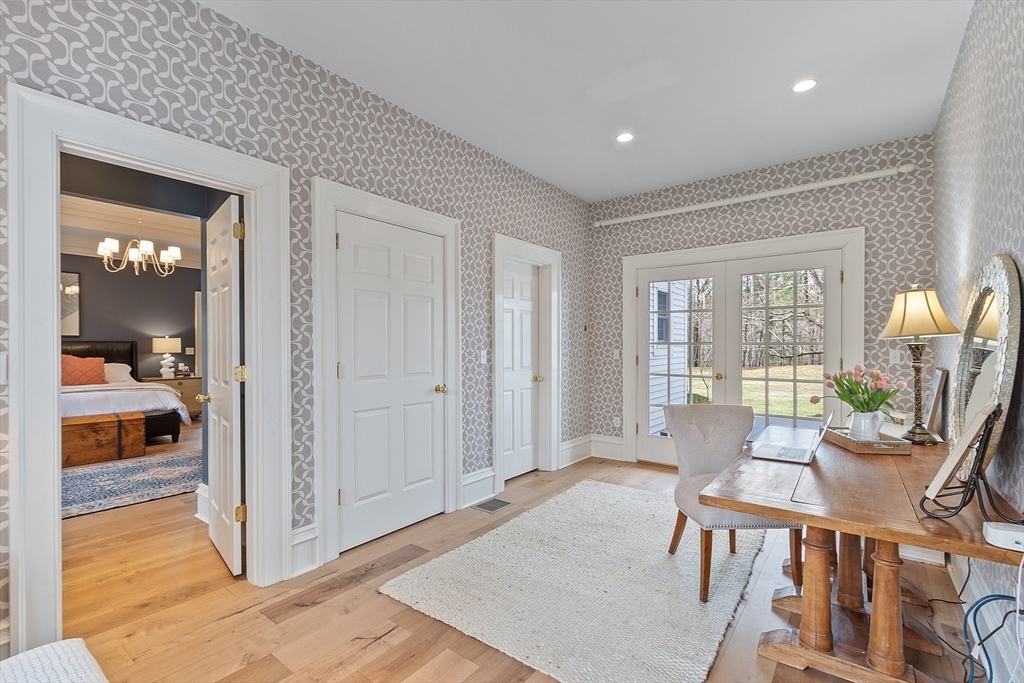 287 Westford Road Concord, MA 01742 - Photo 21 of 42 a living room with furniture and wooden floor