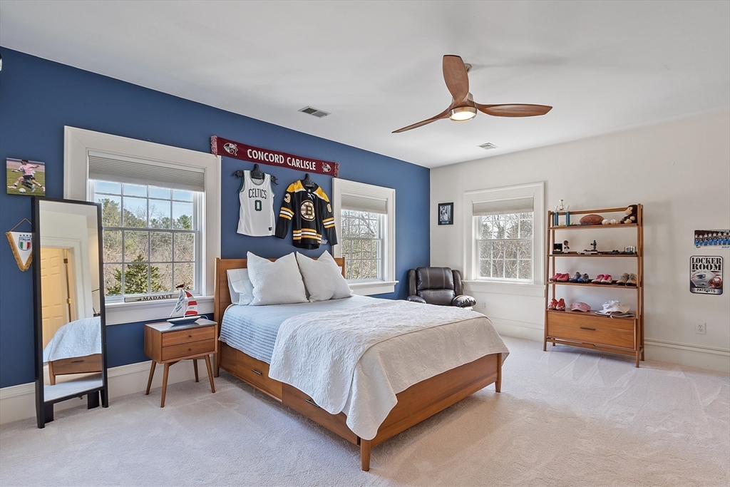 287 Westford Road Concord, MA 01742 - Photo 28 of 42 a bedroom with a large bed and a window