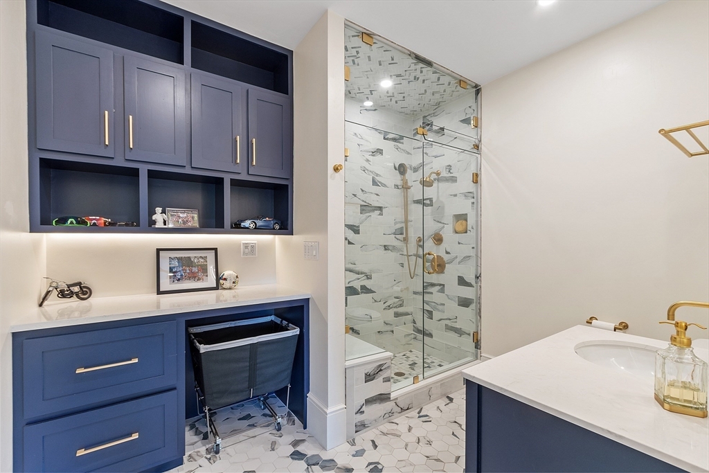 287 Westford Road Concord, MA 01742 - Photo 29 of 42 a kitchen with a sink a stove and cabinets