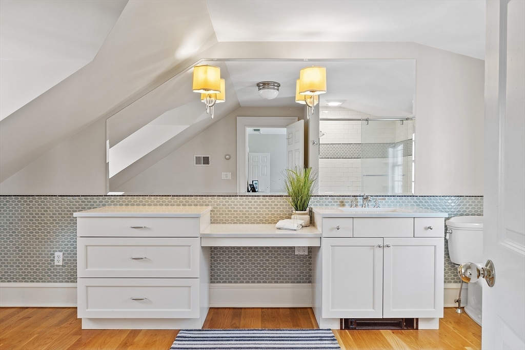 287 Westford Road Concord, MA 01742 - Photo 31 of 42 a bathroom with a sink and a mirror