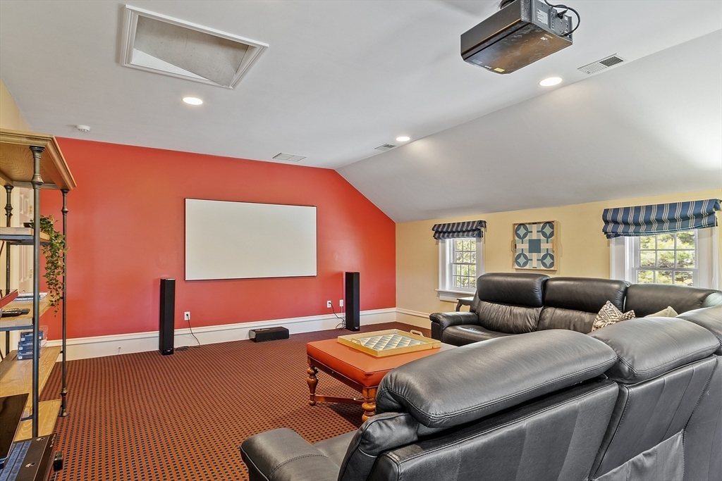 287 Westford Road Concord, MA 01742 - Photo 35 of 42 a living room with furniture and a air conditioner vent