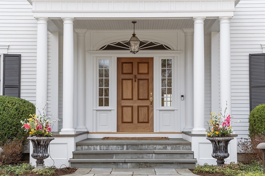287 Westford Road Concord, MA 01742 - Photo 4 of 42 a front view of a house with a porch