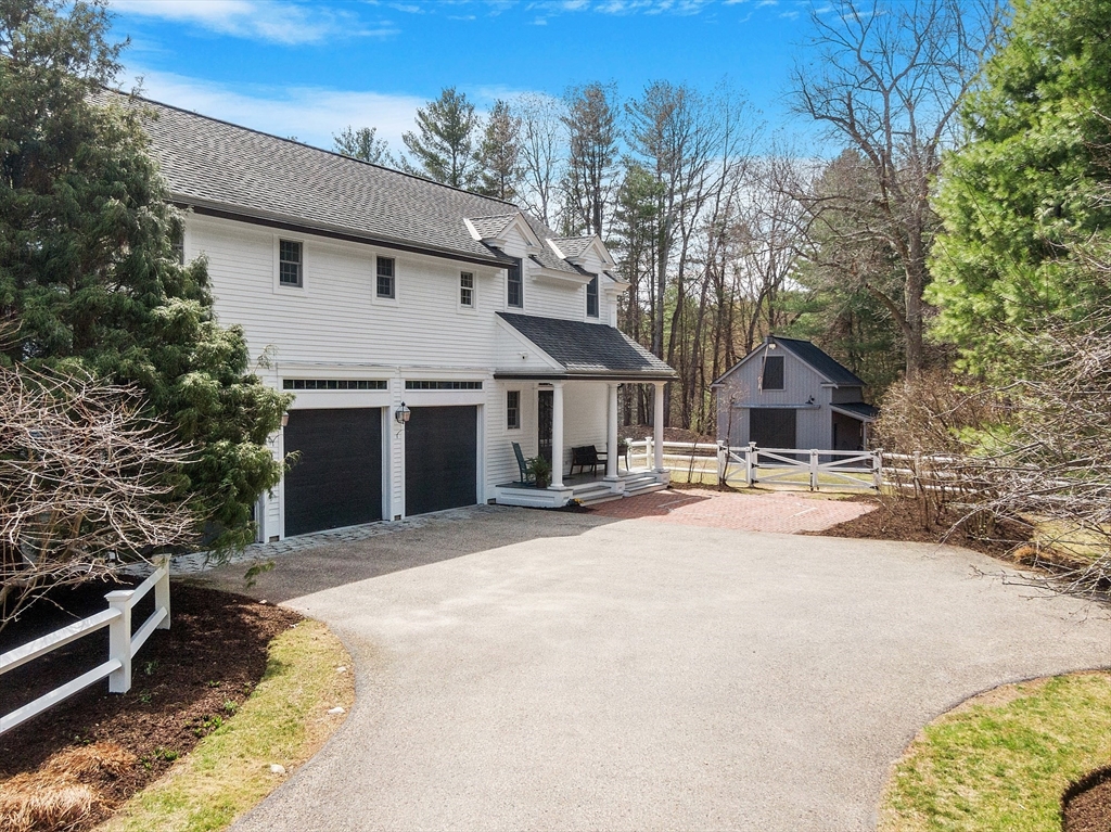 287 Westford Road Concord, MA 01742 - Photo 41 of 42 a front view of a house with a yard