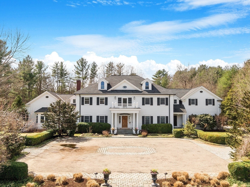 287 Westford Road Concord, MA 01742 - Photo 42 of 42 a front view of a house with a garden