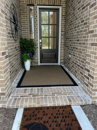 a view of a back yard from a patio
