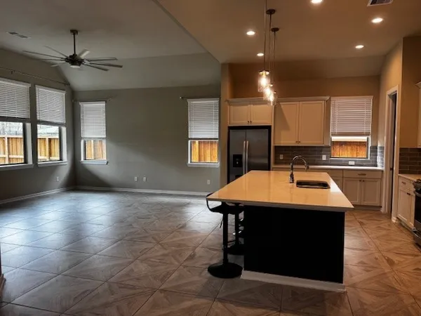 an empty room with a bathroom