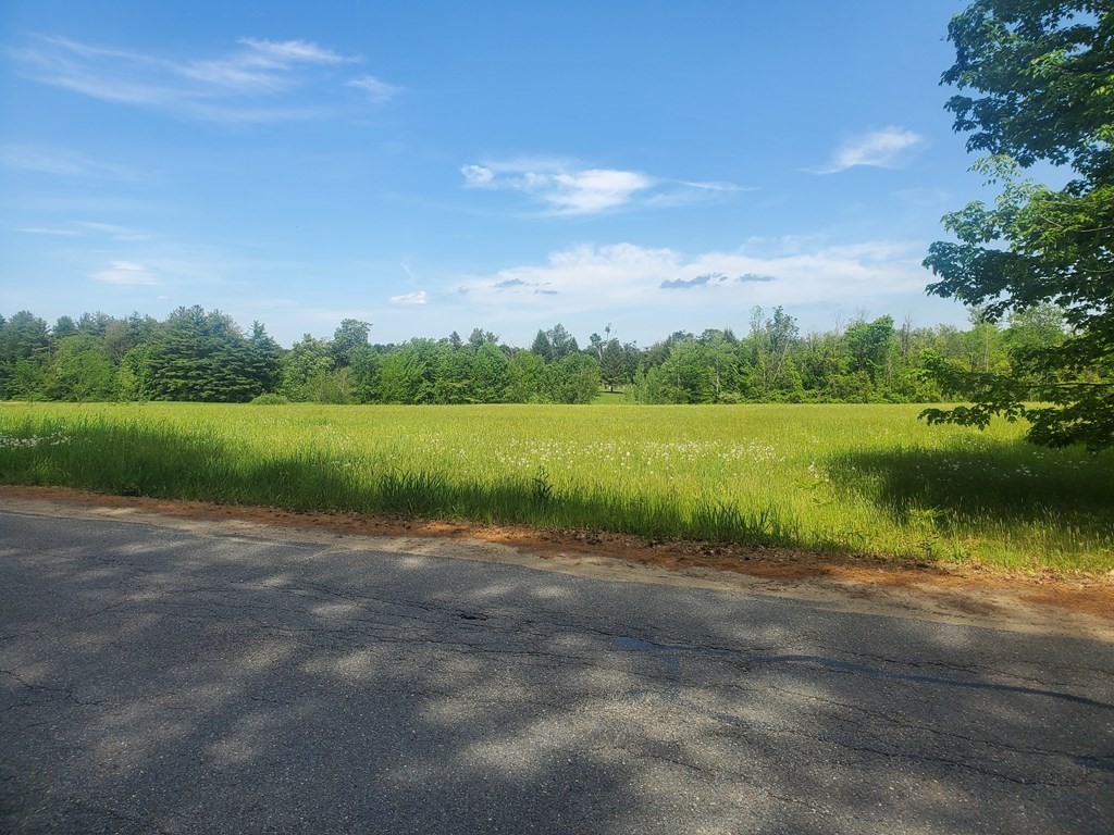 173 South Road Ashby, MA 01431 - Photo 4 of 4 a view of a lake with houses in the background