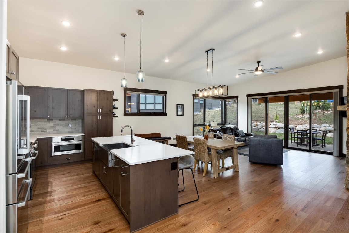 17 Vendette Road Silverthorne, CO 80498 - Photo 12 of 50 a large kitchen with a table and chairs
