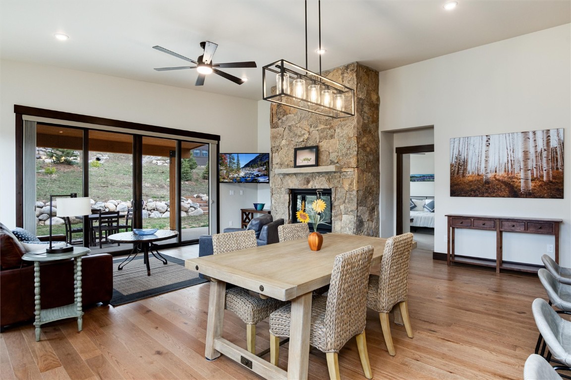 17 Vendette Road Silverthorne, CO 80498 - Photo 17 of 50 a view of a dining room with furniture window and wooden floor