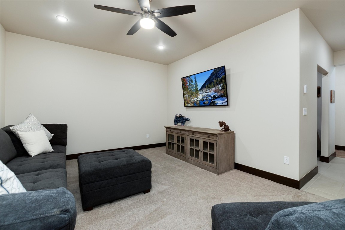 17 Vendette Road Silverthorne, CO 80498 - Photo 29 of 50 a living room with furniture and a flat screen tv