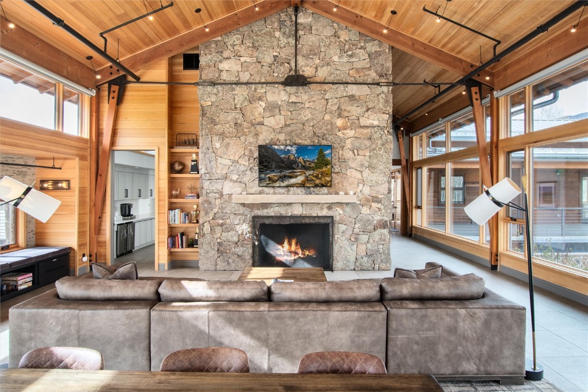 17 Vendette Road Silverthorne, CO 80498 - Photo 37 of 50 a living room with furniture and a fireplace