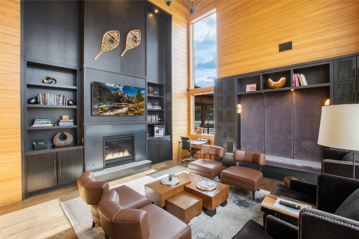 17 Vendette Road Silverthorne, CO 80498 - Photo 42 of 50 a living room with furniture a flat screen tv and a fireplace