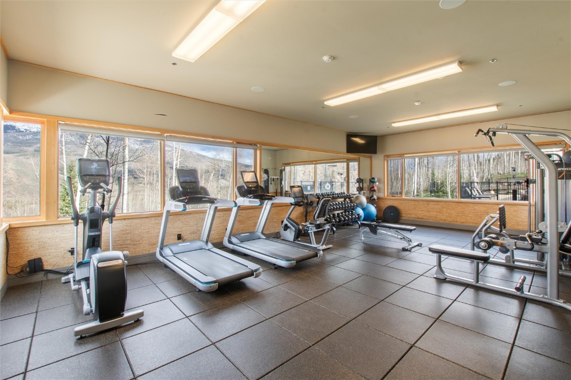 17 Vendette Road Silverthorne, CO 80498 - Photo 44 of 50 a living room with furniture and floor to ceiling window