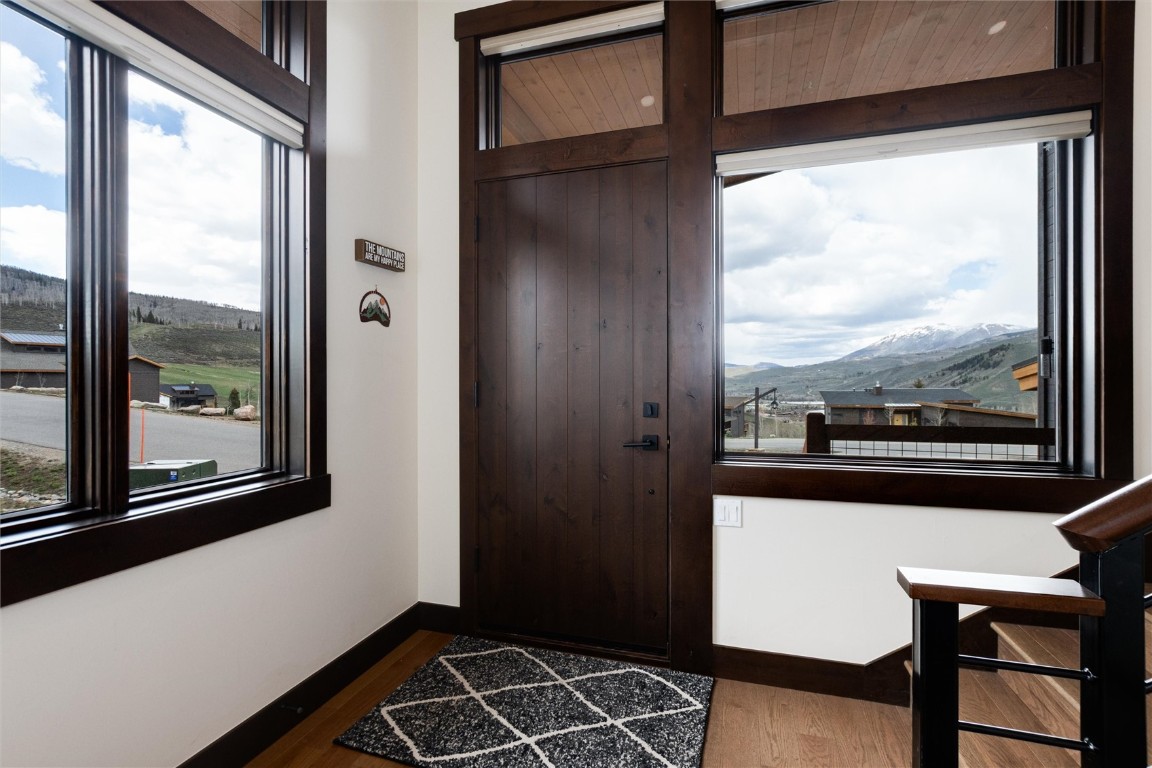 17 Vendette Road Silverthorne, CO 80498 - Photo 10 of 50 a view of a room with a large window and wooden floor