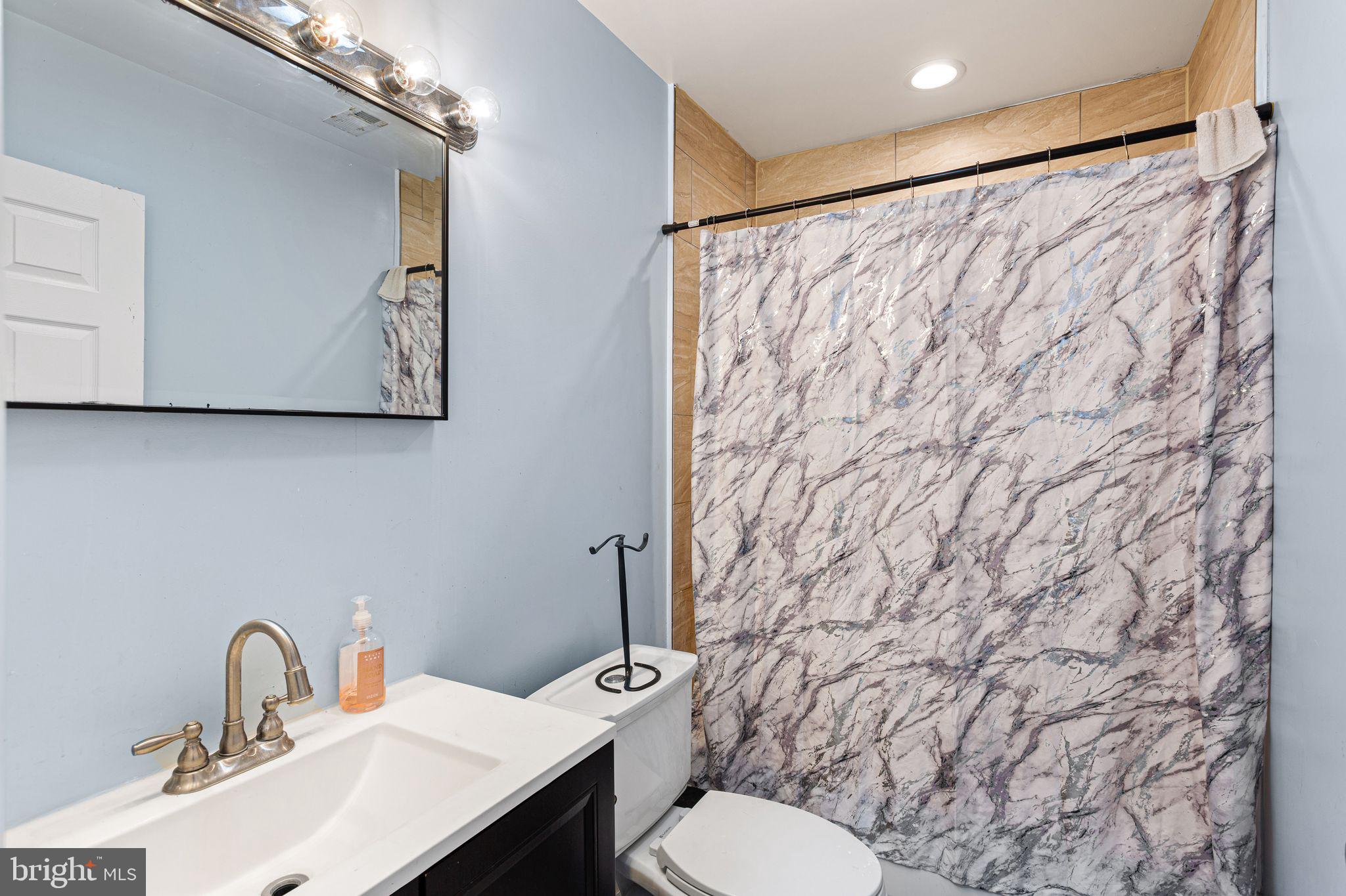 68 North Springfield Road Clifton Heights, PA 19018 - Photo 23 of 26 Modern bathroom with serene hues.