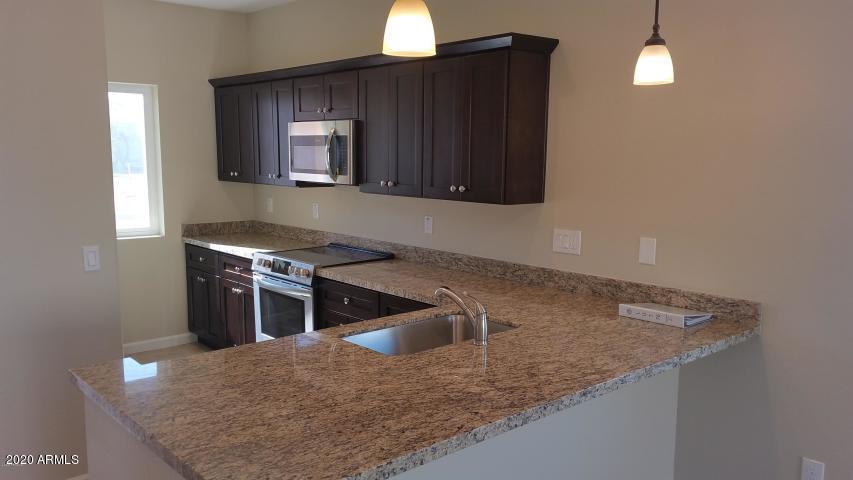 611 West Harwell Rd. Phoenix, AZ 85041 - Photo 4 of 15 Bethany A kitchen 3