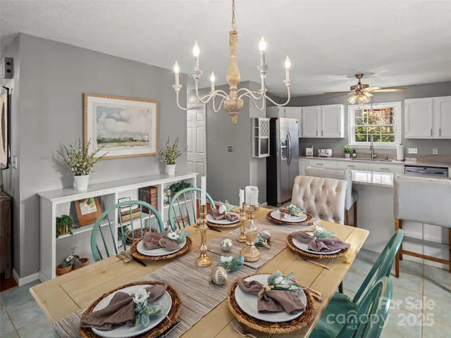 a bedroom with a bed a couch and a dresser