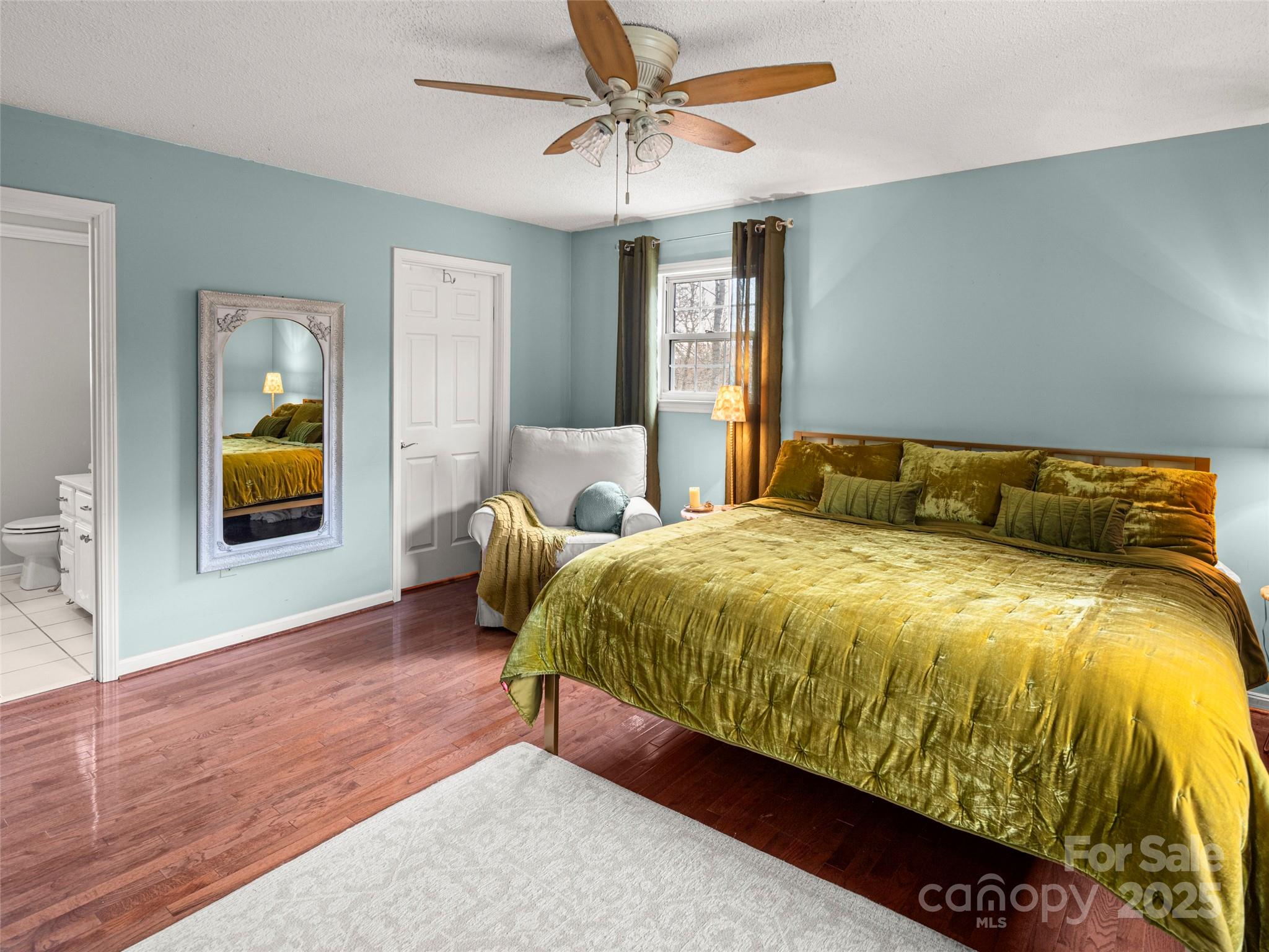 33 Ivy Cove Road Fairview, NC 28730 - Photo 23 of 36 a bed sitting in a spacious bedroom next to a window