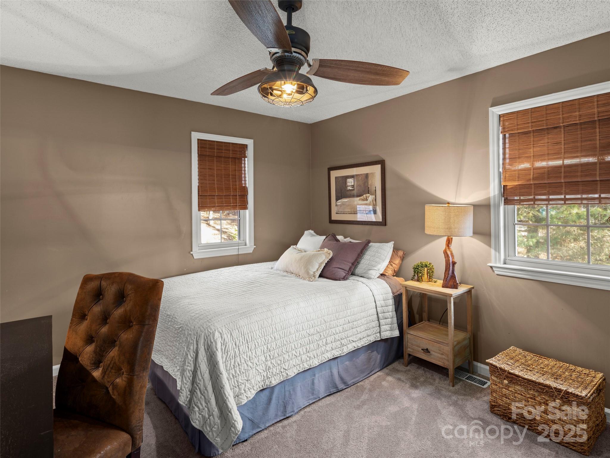 33 Ivy Cove Road Fairview, NC 28730 - Photo 27 of 36 a bedroom with a bed and window