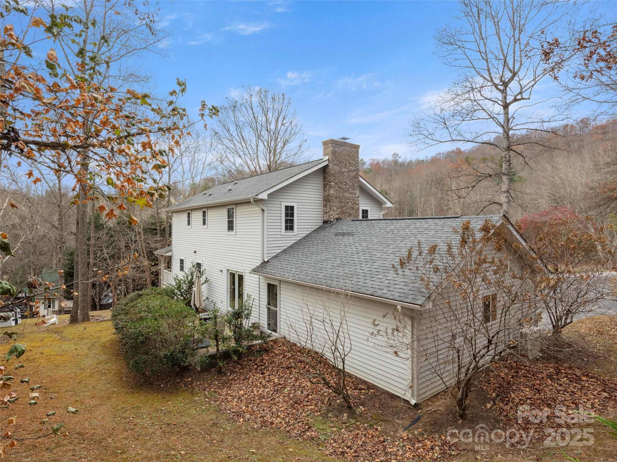 33 Ivy Cove Road Fairview, NC 28730 - Photo 31 of 36 a view of a house with a snow in the background