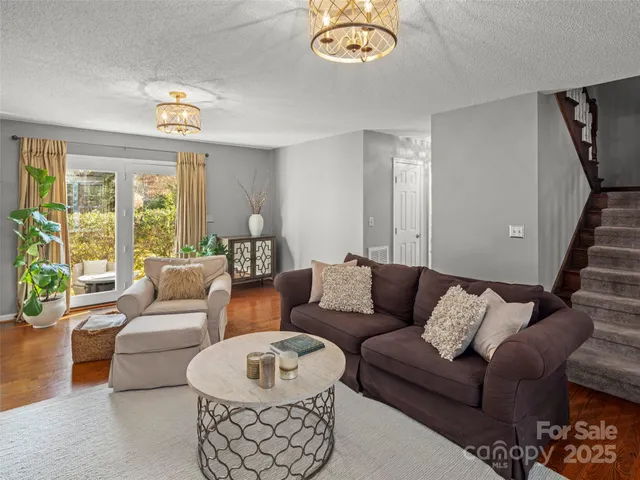 a kitchen with stainless steel appliances granite countertop a stove sink and cabinets