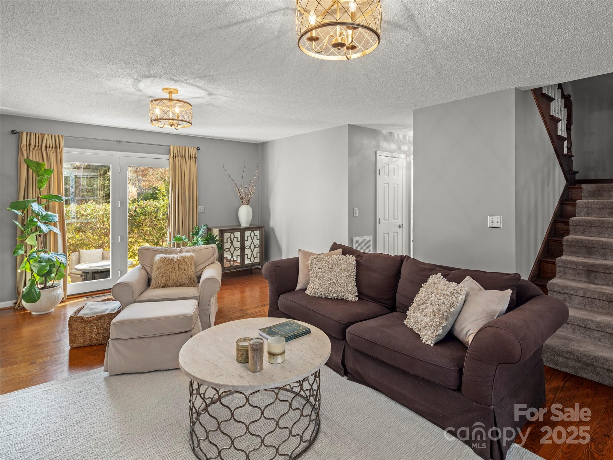 33 Ivy Cove Road Fairview, NC 28730 - Photo 10 of 36 a living room with furniture and a large window