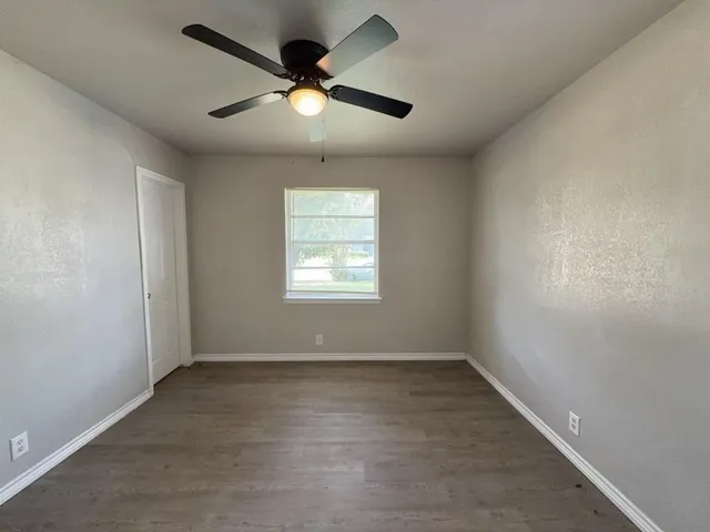 an empty room with window