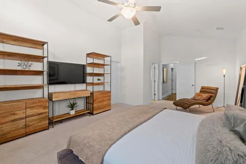 a bedroom with a bed and furniture