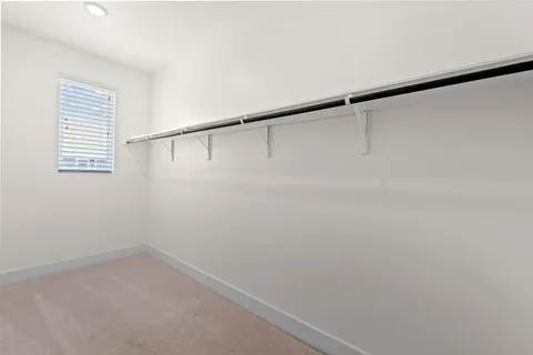 a view of small space with racks on the wall