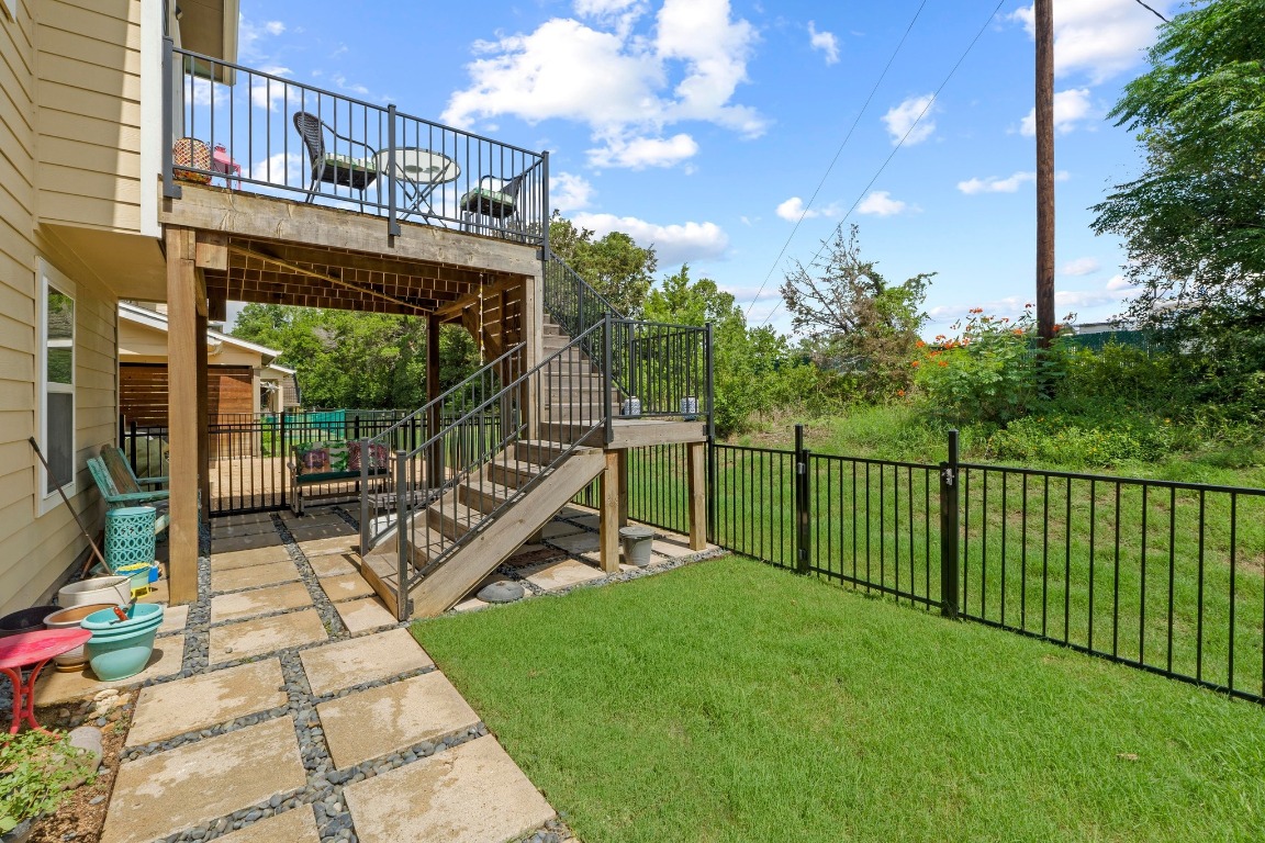 7407 Merrick Lane Austin, TX 78745 - Photo 2 of 34 a view of a roof deck with couches and wooden floor