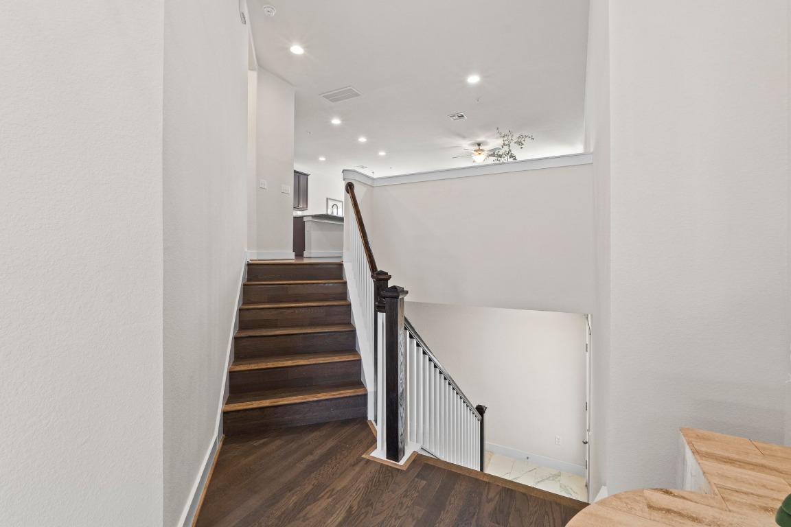 7407 Merrick Lane Austin, TX 78745 - Photo 5 of 34 a view of entryway and hall with wooden floor