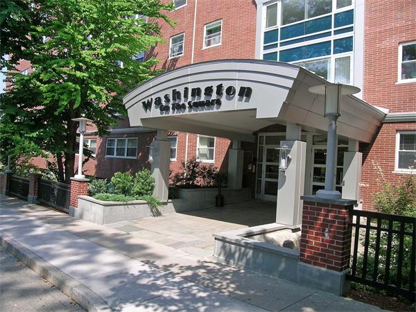 1600 Beacon Street, Unit 401 Brookline, MA 02446 - Photo 14 of 22 a front view of a house with a yard