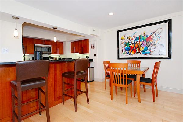 1600 Beacon Street, Unit 401 Brookline, MA 02446 - Photo 4 of 22 a view of a dining room with furniture