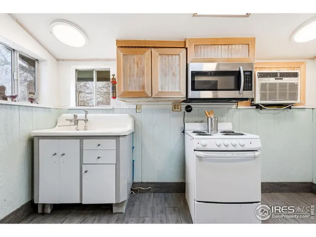 a bathroom with a sink double vanity and a mirror