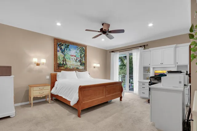 a bedroom with a bed furniture and window