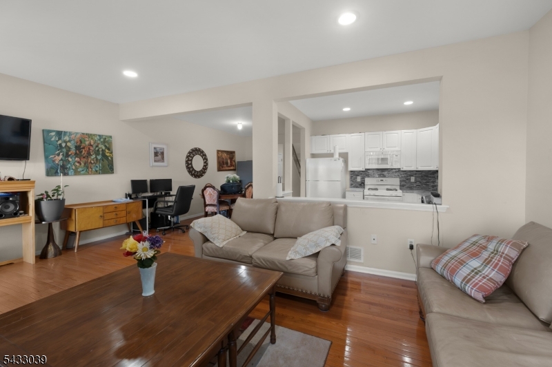 158 Autumn Ridge Road Morris Plains, NJ 07950 - Photo 5 of 26 a living room with furniture kitchen view and a window