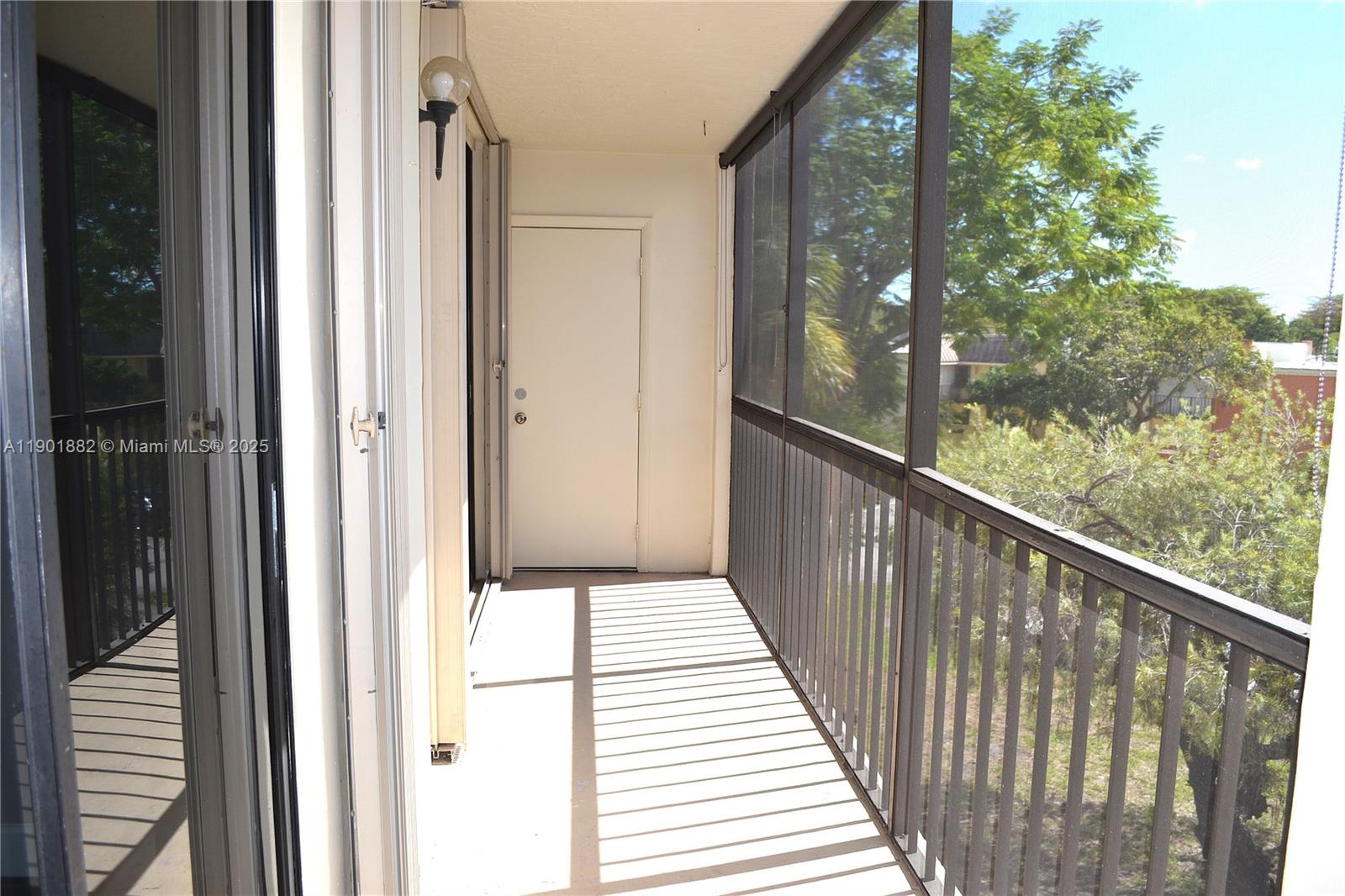 8045 Southwest 107th Avenue, Unit 303 Miami, FL 33173 - Photo 19 of 26 a view of balcony