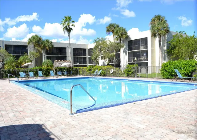 a front view of a house having yard