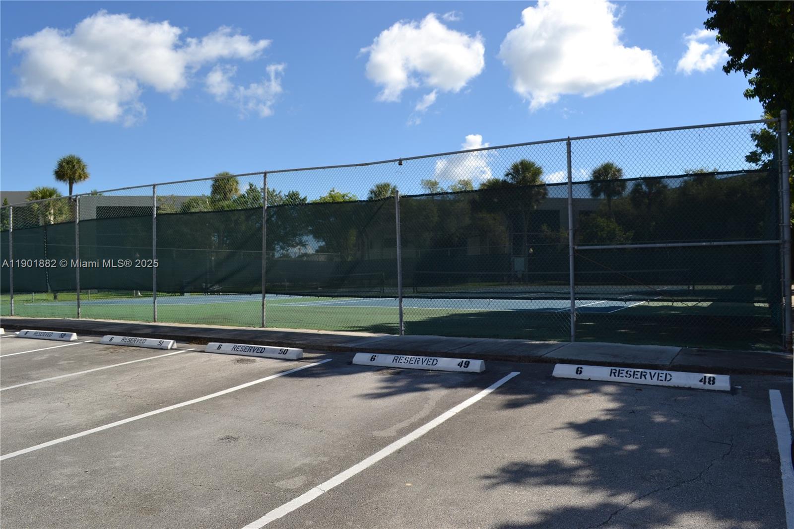 8045 Southwest 107th Avenue, Unit 303 Miami, FL 33173 - Photo 24 of 26 a view of a tennis court