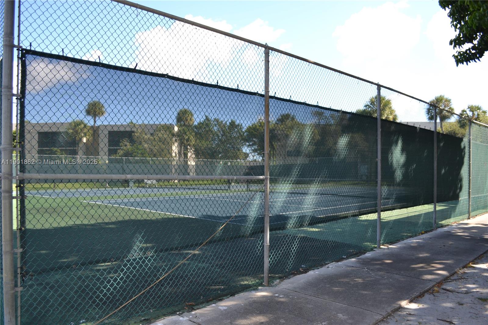 8045 Southwest 107th Avenue, Unit 303 Miami, FL 33173 - Photo 25 of 26 a view of outdoor space and yard