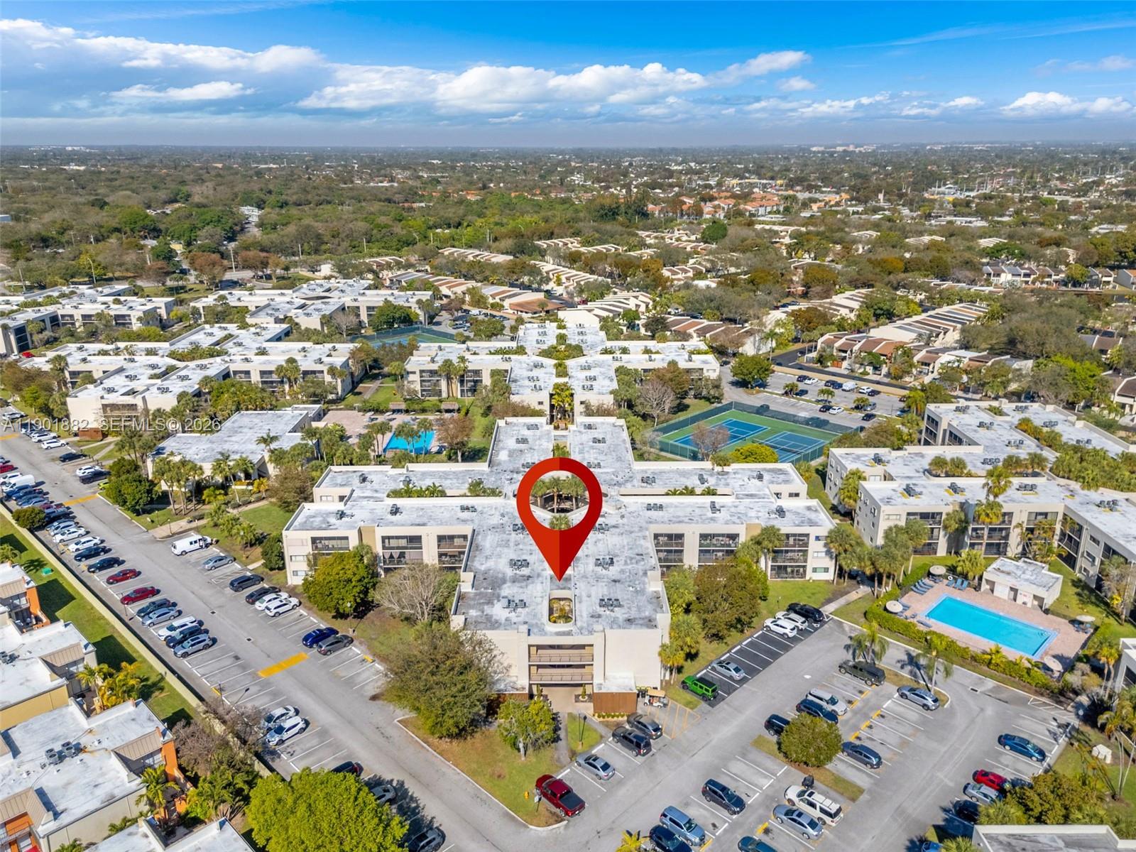 8045 Southwest 107th Avenue, Unit 303 Miami, FL 33173 - Photo 25 of 37 an aerial view of residential houses with outdoor space
