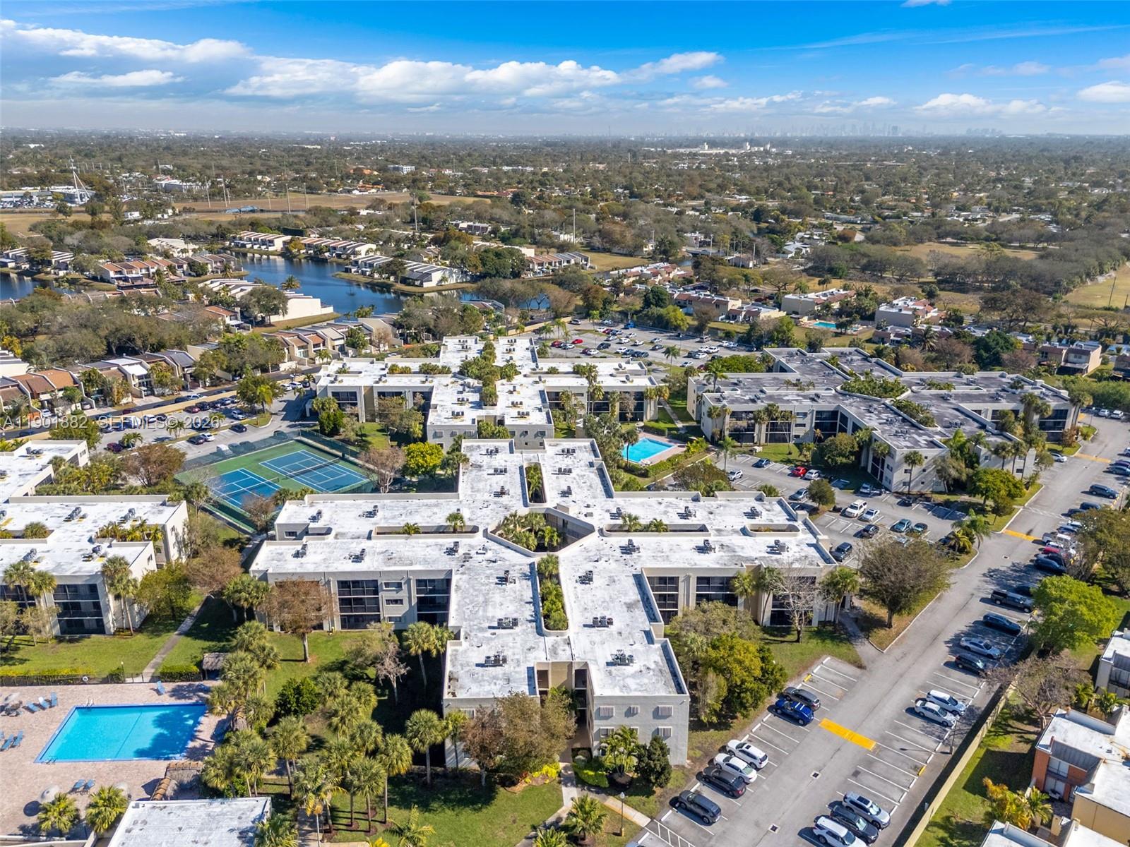 8045 Southwest 107th Avenue, Unit 303 Miami, FL 33173 - Photo 30 of 37 an aerial view of a city with lots of residential buildings