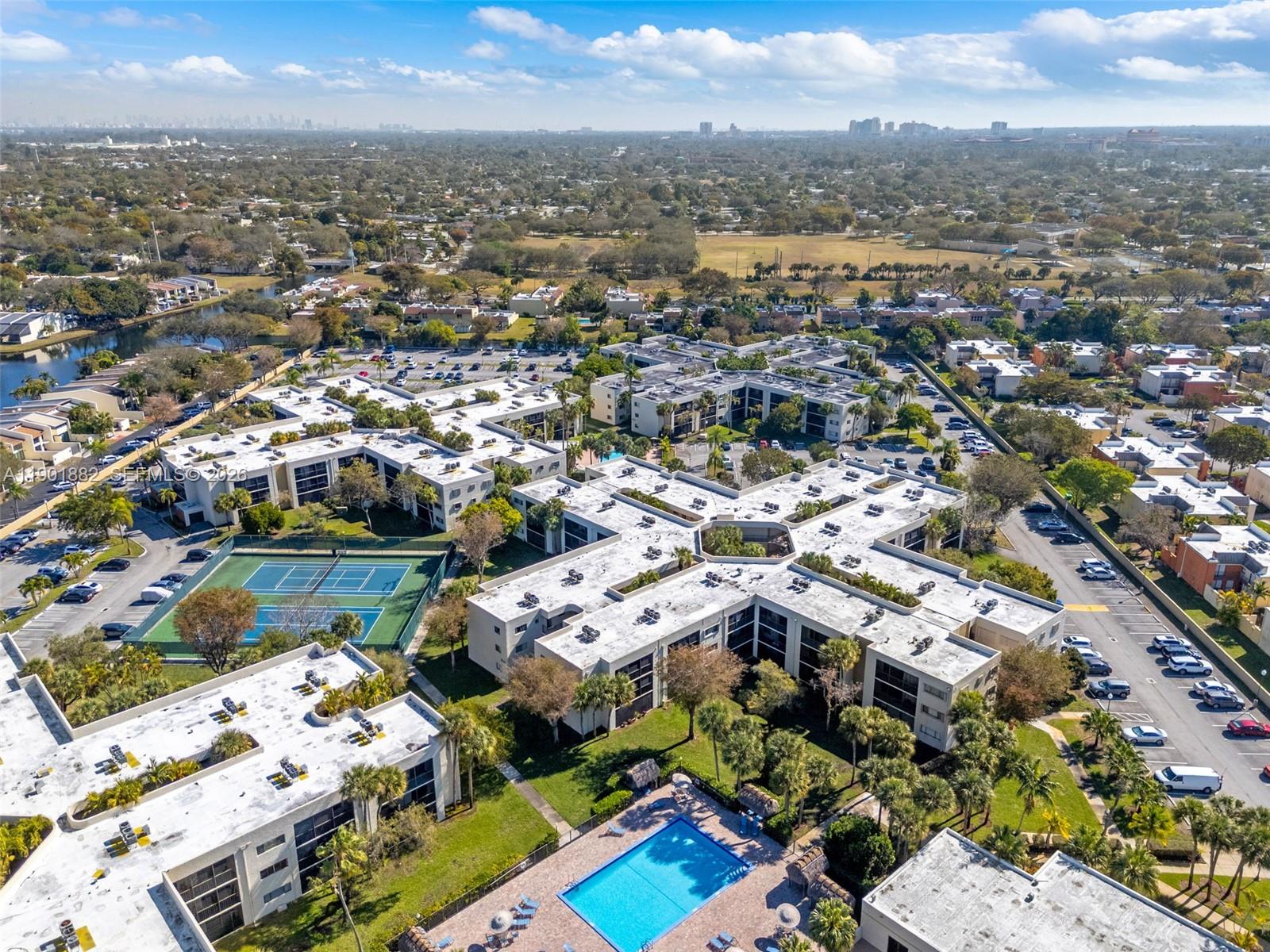 8045 Southwest 107th Avenue, Unit 303 Miami, FL 33173 - Photo 32 of 37 an aerial view of multiple house