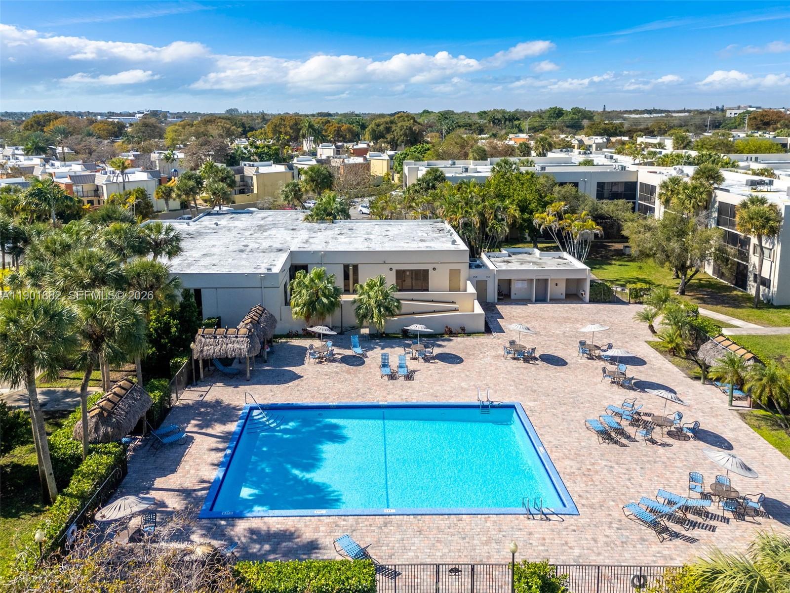 8045 Southwest 107th Avenue, Unit 303 Miami, FL 33173 - Photo 37 of 37 a terrace with outdoor seating and city view