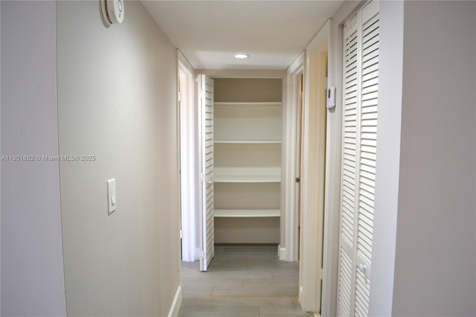 8045 Southwest 107th Avenue, Unit 303 Miami, FL 33173 - Photo 9 of 26 a view of an empty room and a window