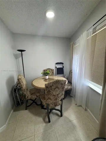 a room with furniture and window